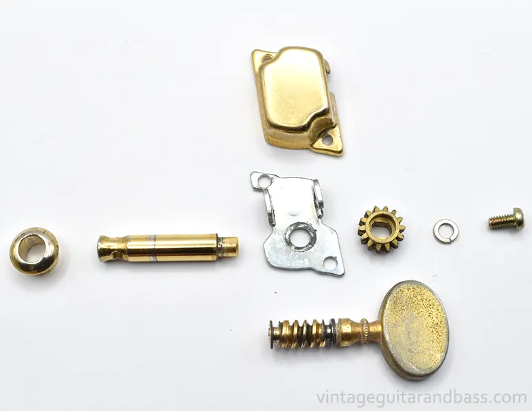 Disassembled Matsumoku closed gear individual tuner showing constituent parts (top view)