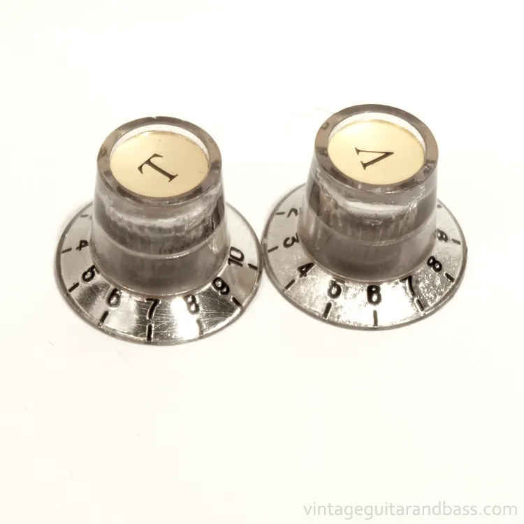 A set of two Matsumoku metal capped control knobs in silver